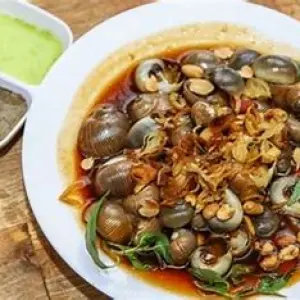Ốc Mỡ Xào Me